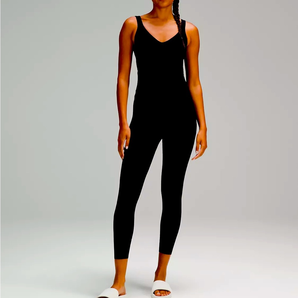 Like new Align Lululemon bodysuit size 4. Black ribbed 25”.